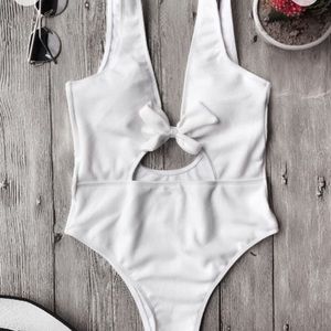 Textured white one piece bathing suit